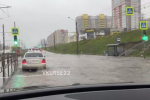 Затопленная дорога на ул. Малахова