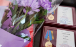 Сотрудники следственного управления СК России по Алтайскому краю вручили памятные медали ветеранам - детям блокадного Ленинграда