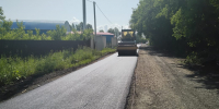 Дорожная служба приступила к укладке нижнего слоя асфальтобетона на автомобильной дороге в СНТ «Росинка» - Администрация г. Барнаул