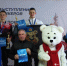 На первой ступени пьедестала Егор Бобров - победитель гонки на 15 км. У подножия подиума тренер СШ "Рубцовск" Игорь Владимирович Мананников. Фото участников соревнований - Газета Алтайский спорт
