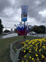 К празднованию Дня города улицы Индустриального района украсили баннерами и флагами с государственной символикой